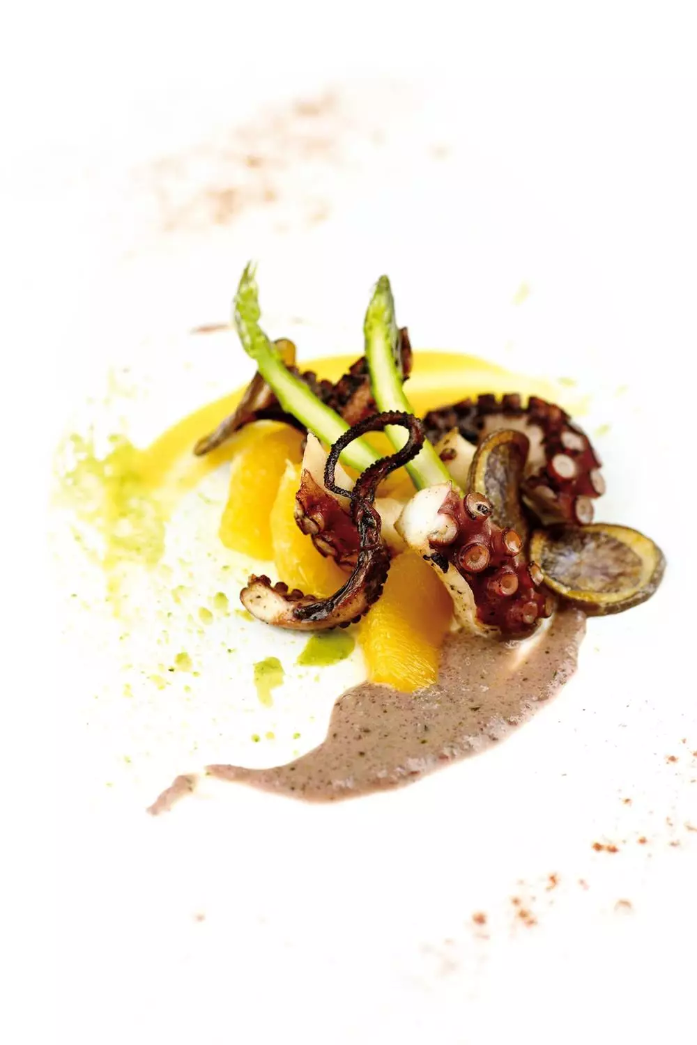 Moscardini con patate viola, arancia, crema di mais e spinaci