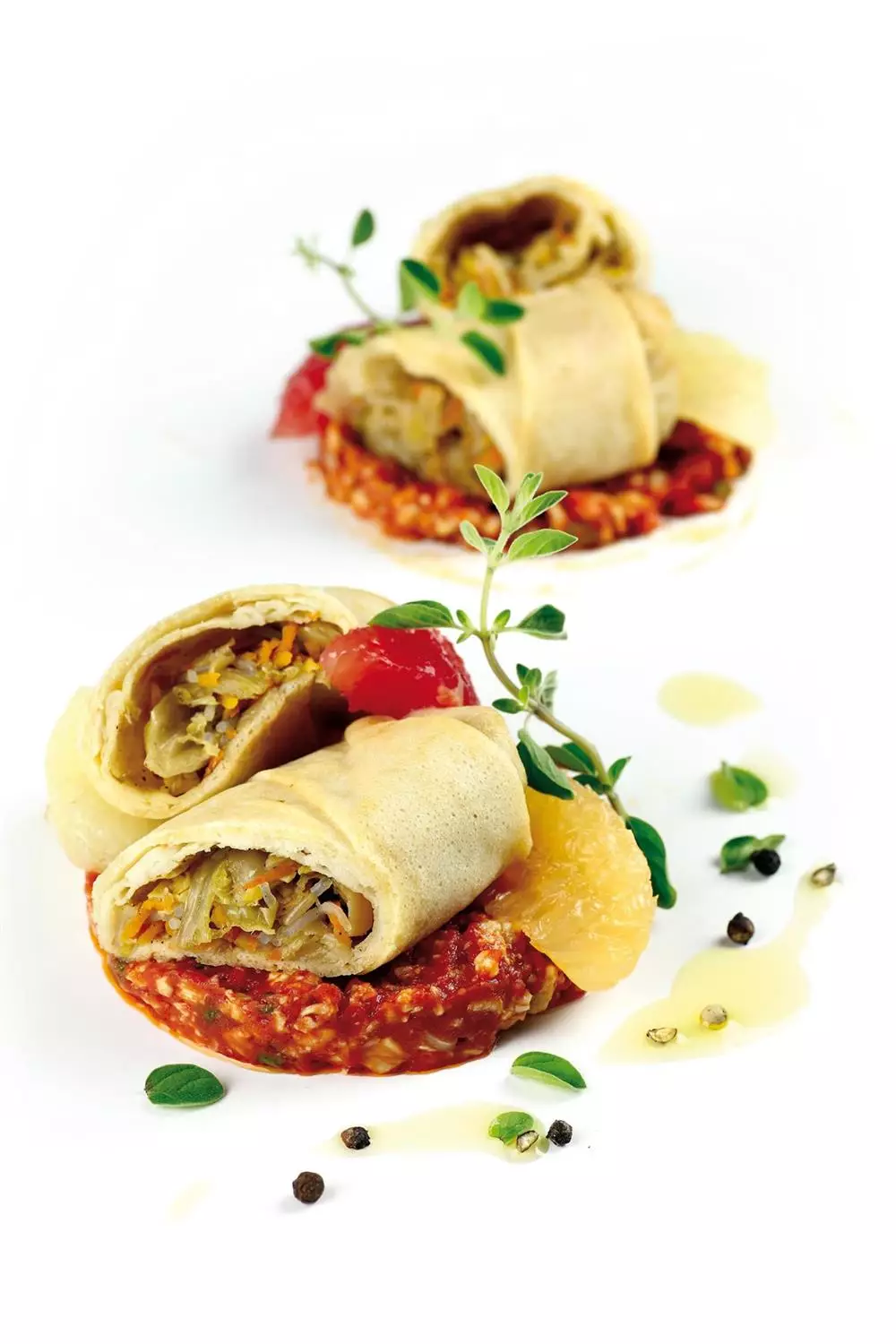 Crepes con ragù di coniglio e pompelmo