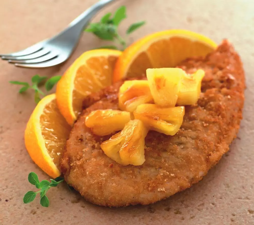 Cotoletta caraibica con ananas caramellato